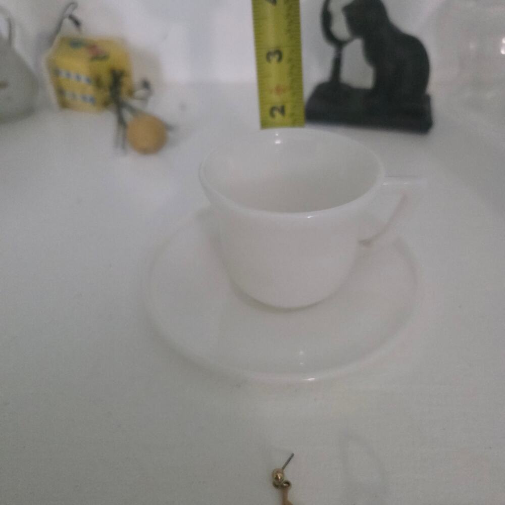 2 in milk glass cup and saucer